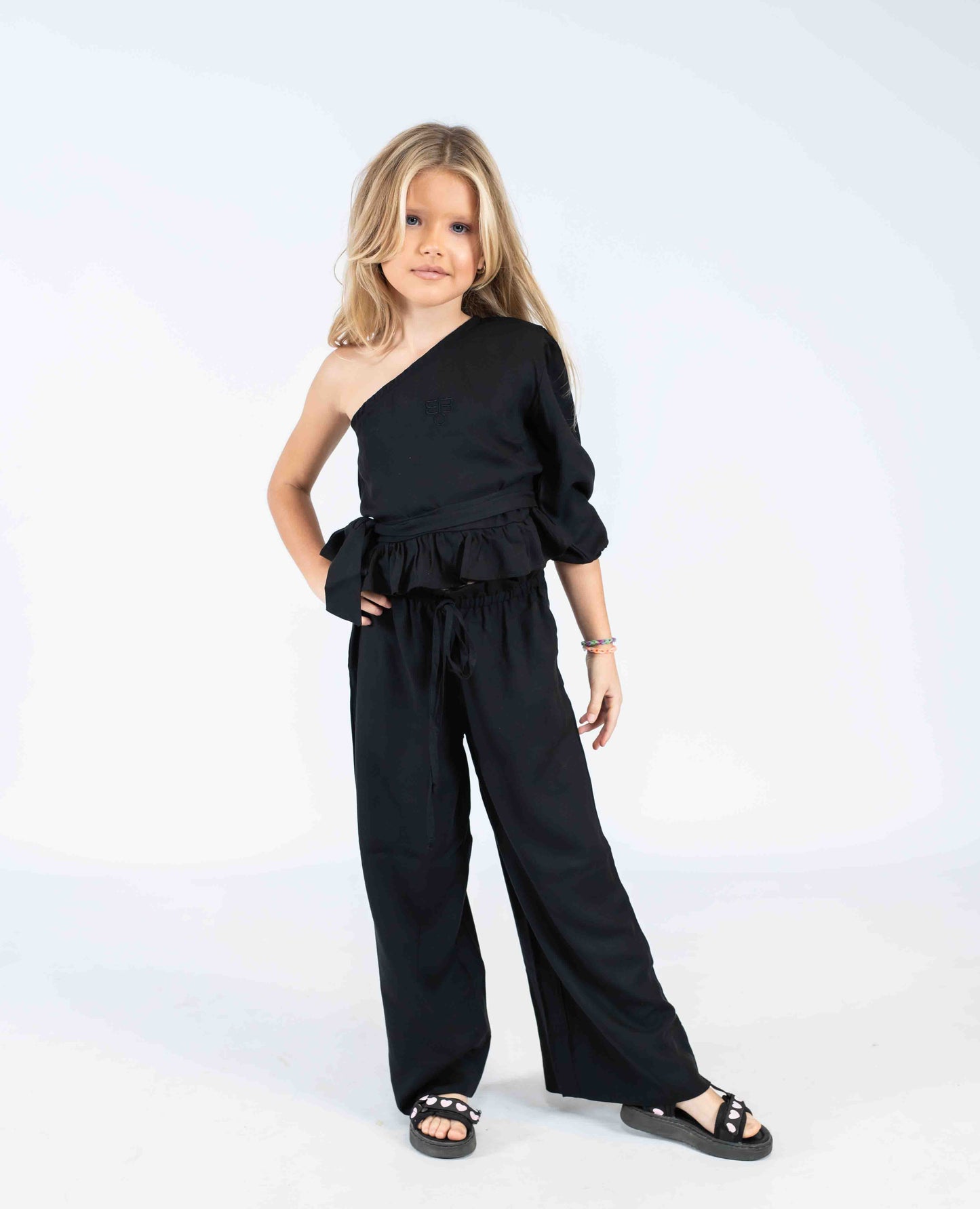 completo bimba nero pantalone palazzo e top monospalla