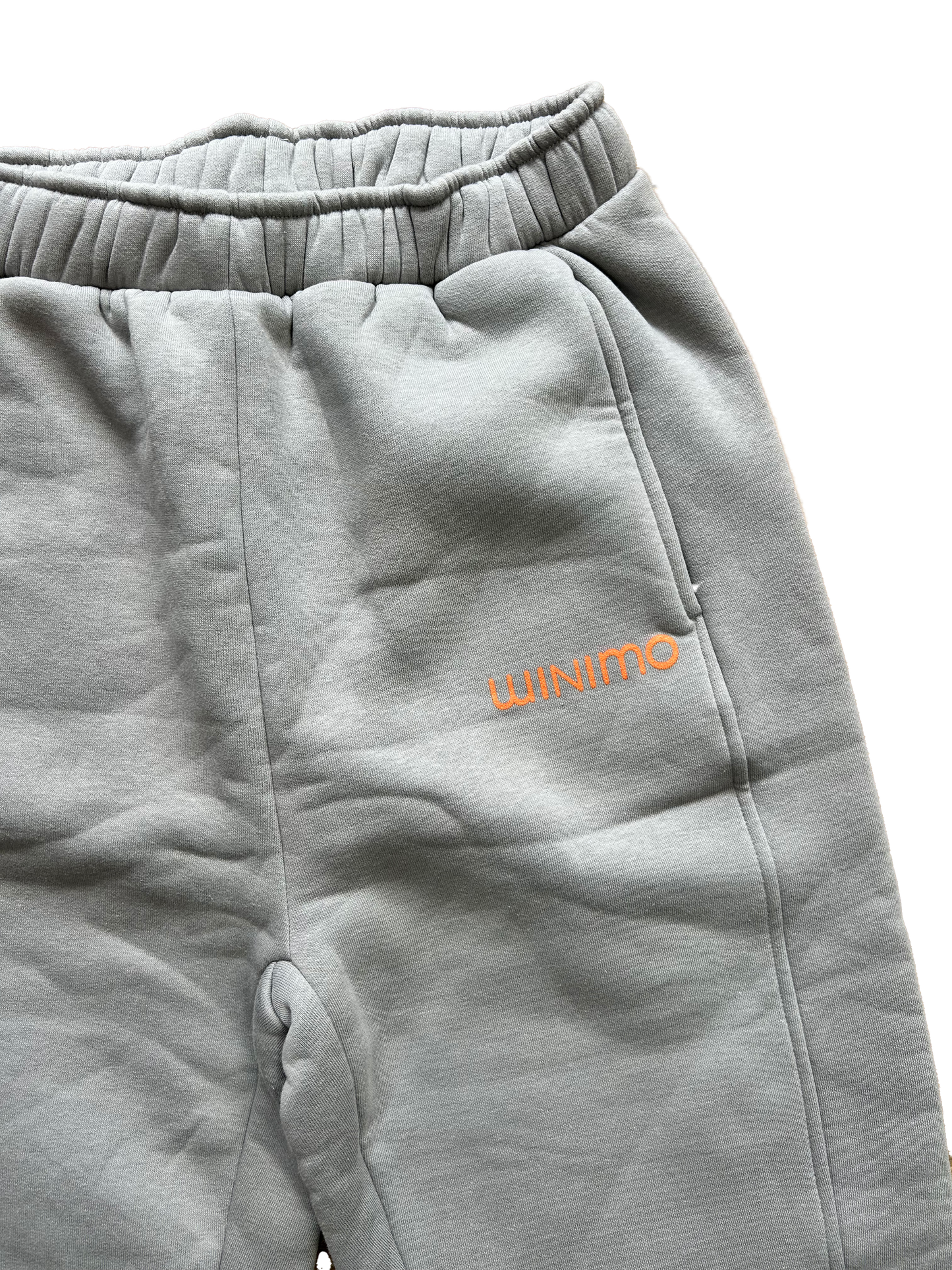 Tuta grigia con dettagli arancio