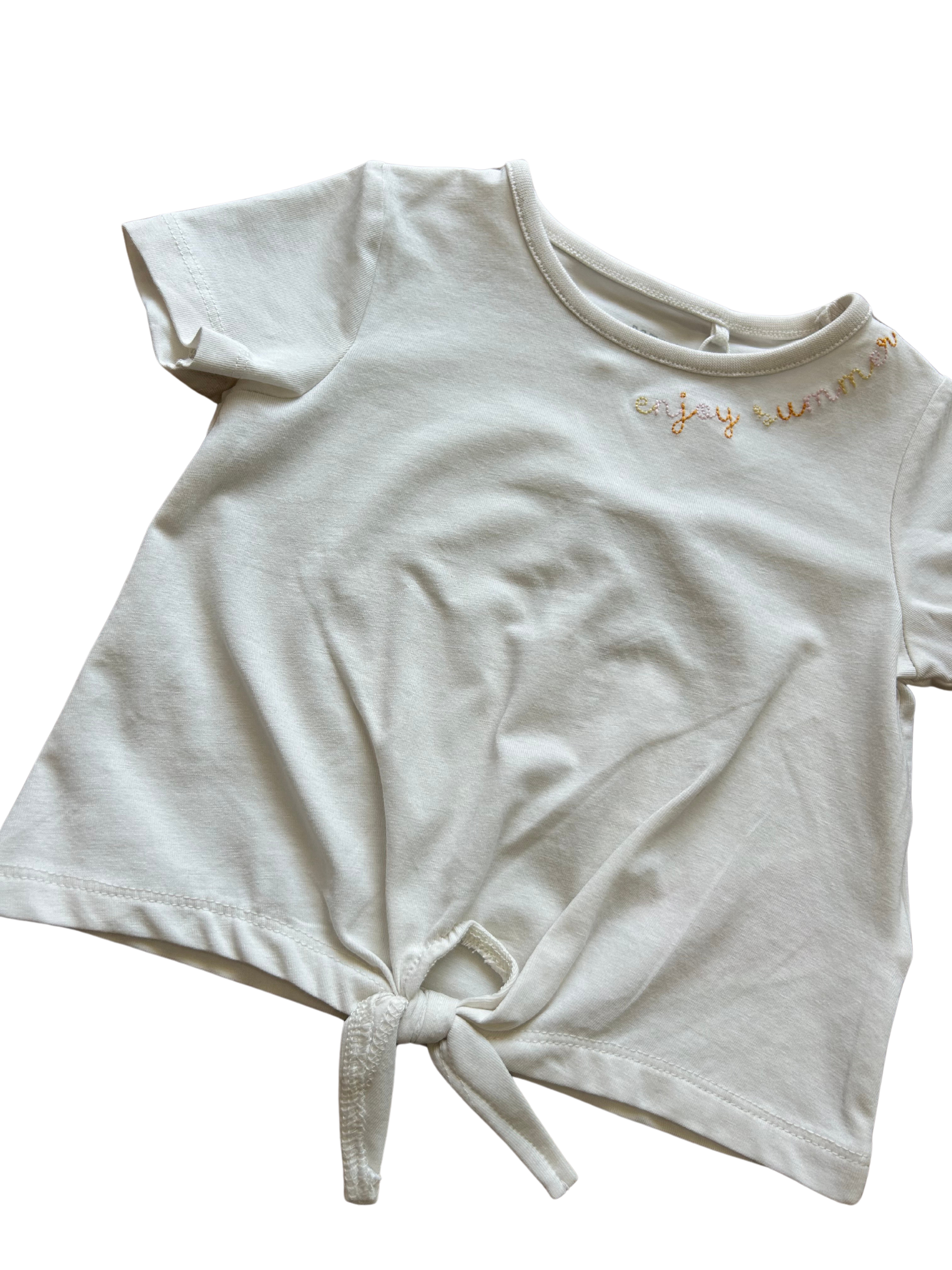 shirt in cotone bianca con ricamo al collo per neonata e bambina