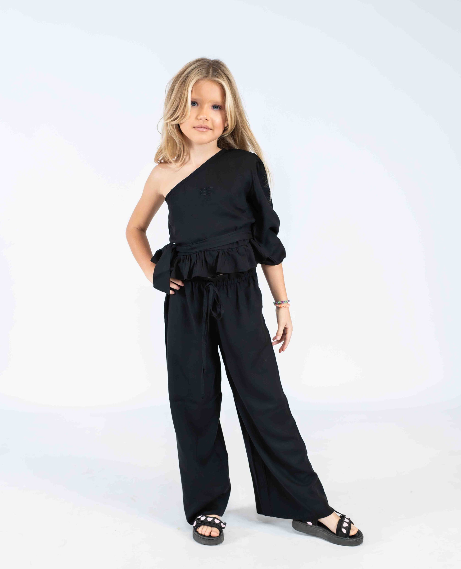 completo bimba nero pantalone palazzo e top monospalla