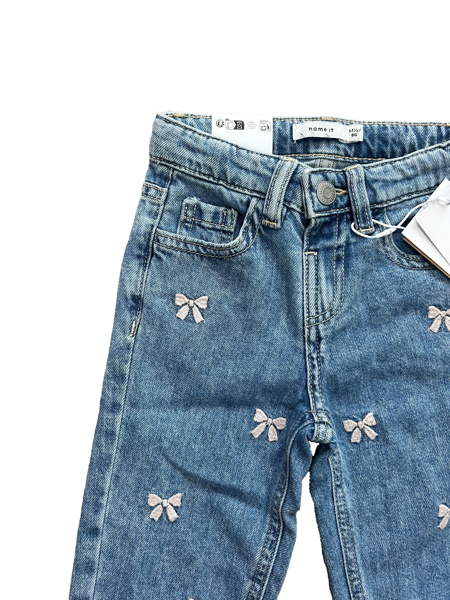 Jeans con ricami fiocchetti