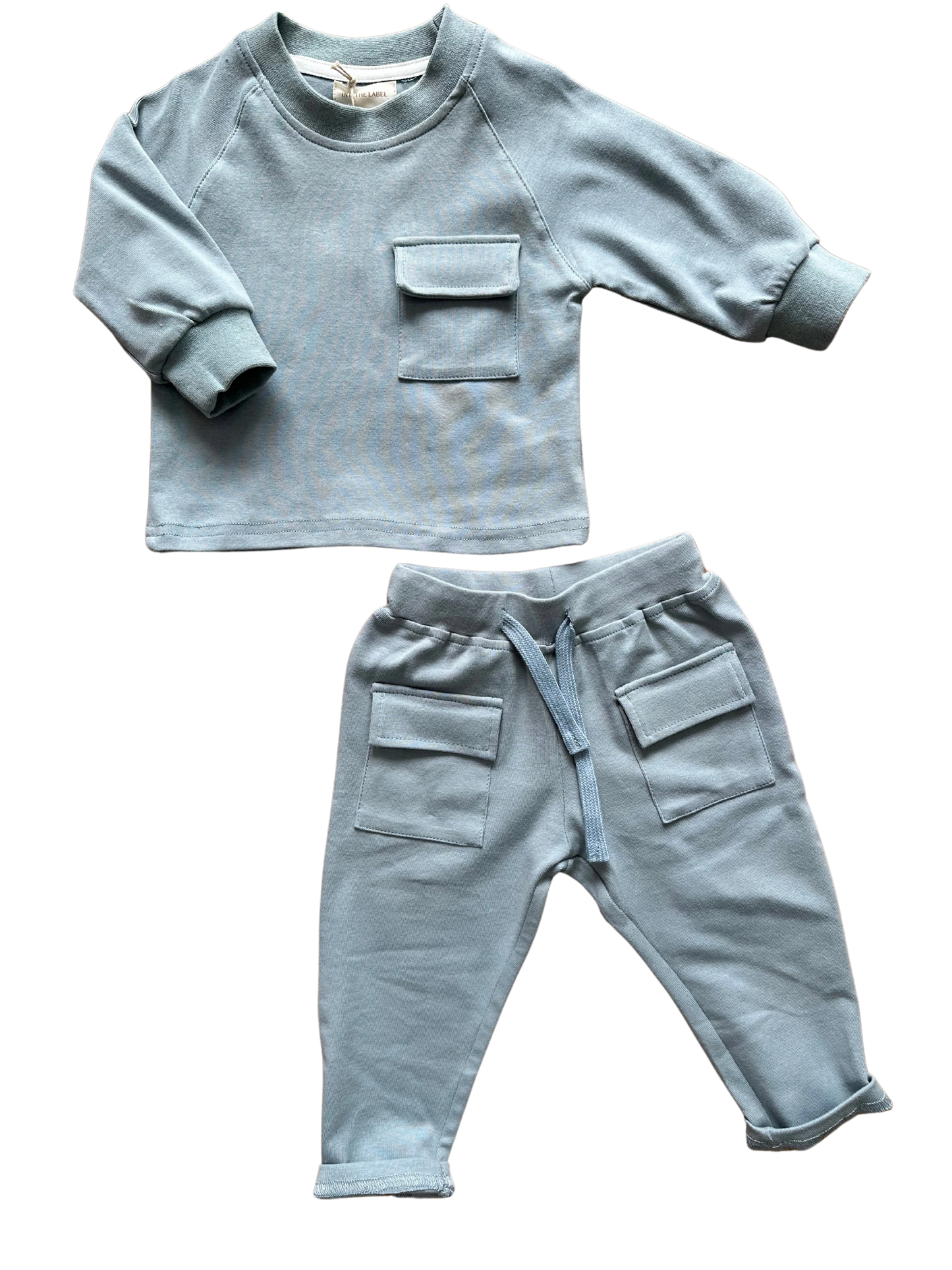 Tuta completa azzurro polvere particolare e comoda per neonati e bambini