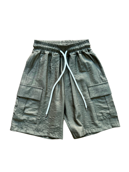 bermuda verde militare con elastico in vita e tasconi laterali per bambino e ragazzo