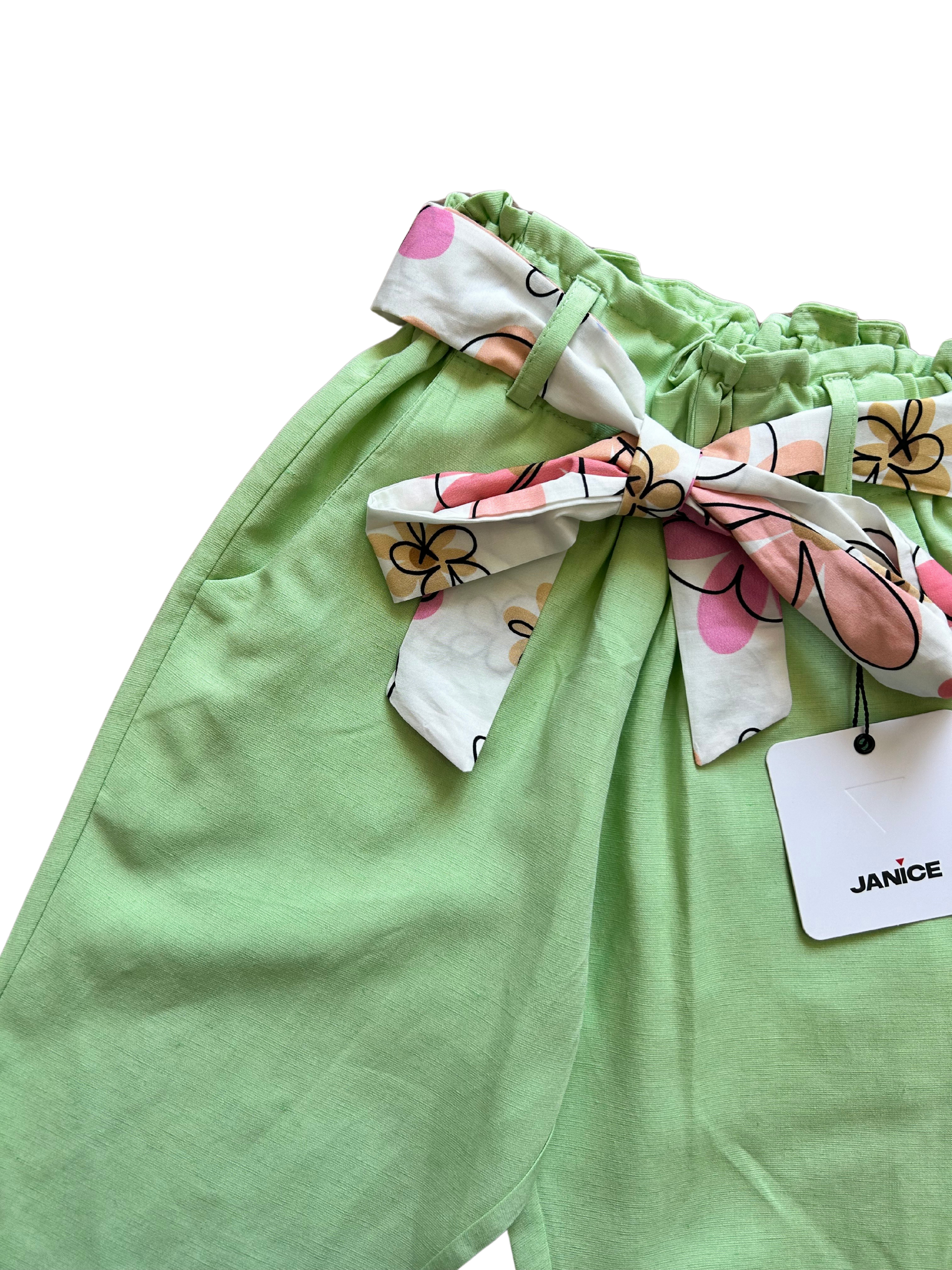 pantalone largo verde mela con elastico in vita e cinta a fantasia per bambina