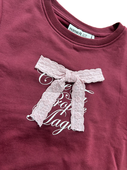 Felpa girocollo bordeaux con fiocco sangallo