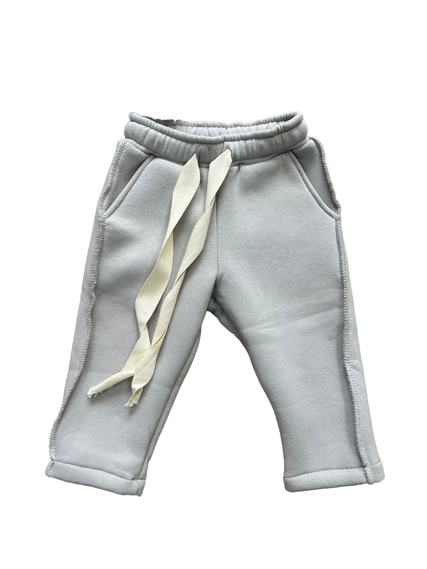 Tuta grigia con cuciture a vista