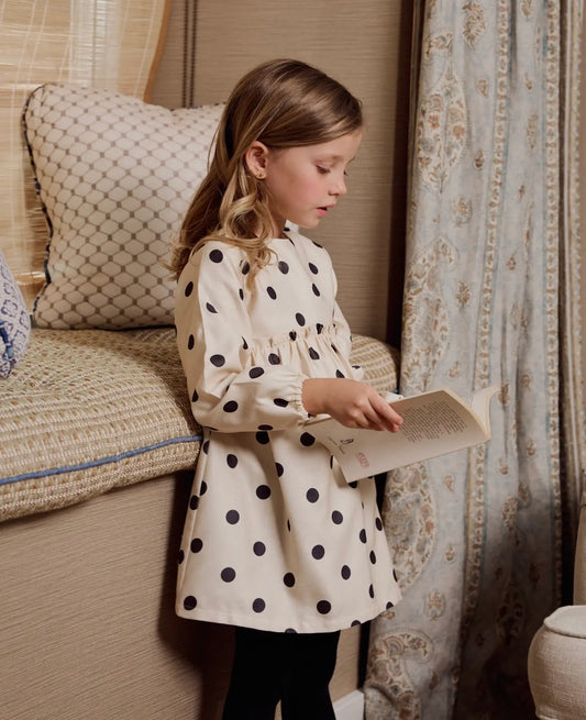 abitino a pois svasato con fiocco sul retro per bambina