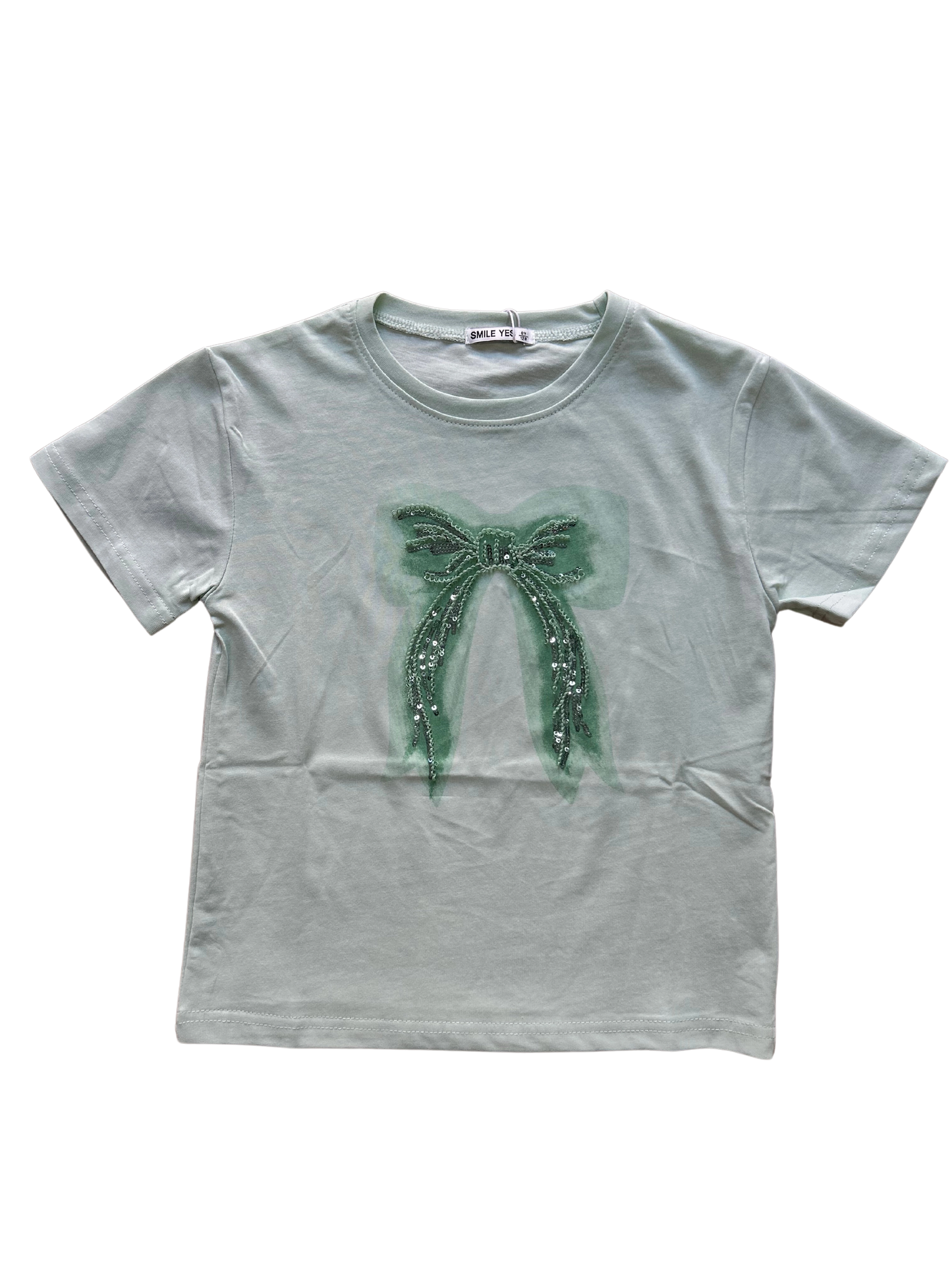 t-shirt verde chiaro in cotone con fiocco in paillettes per bambina e ragazza