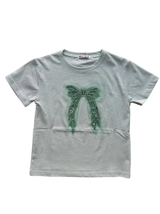 t-shirt verde chiaro in cotone con fiocco in paillettes per bambina e ragazza